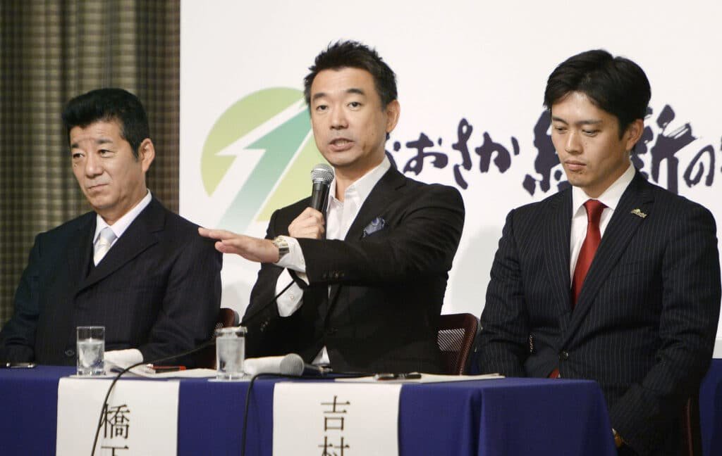 Ishin no Kai. Hashimoto Toru (centre) with Matsui Ichiro (left) and Yoshimura Hirofumi (right). Source: The Japan Times https://www.japantimes.co.jp/news/2015/10/31/national/politics-diplomacy/osaka-mayor-toru-hashimotos-new-party-debuts/
